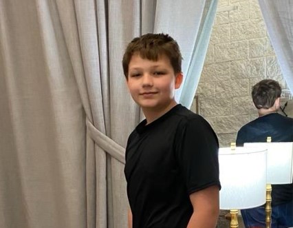 Trey after completing Eat To Lose, a kid-friendly program