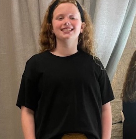 Photo of a smiling girl after losing 12 pounds in 21 days following the Eat to Lose program